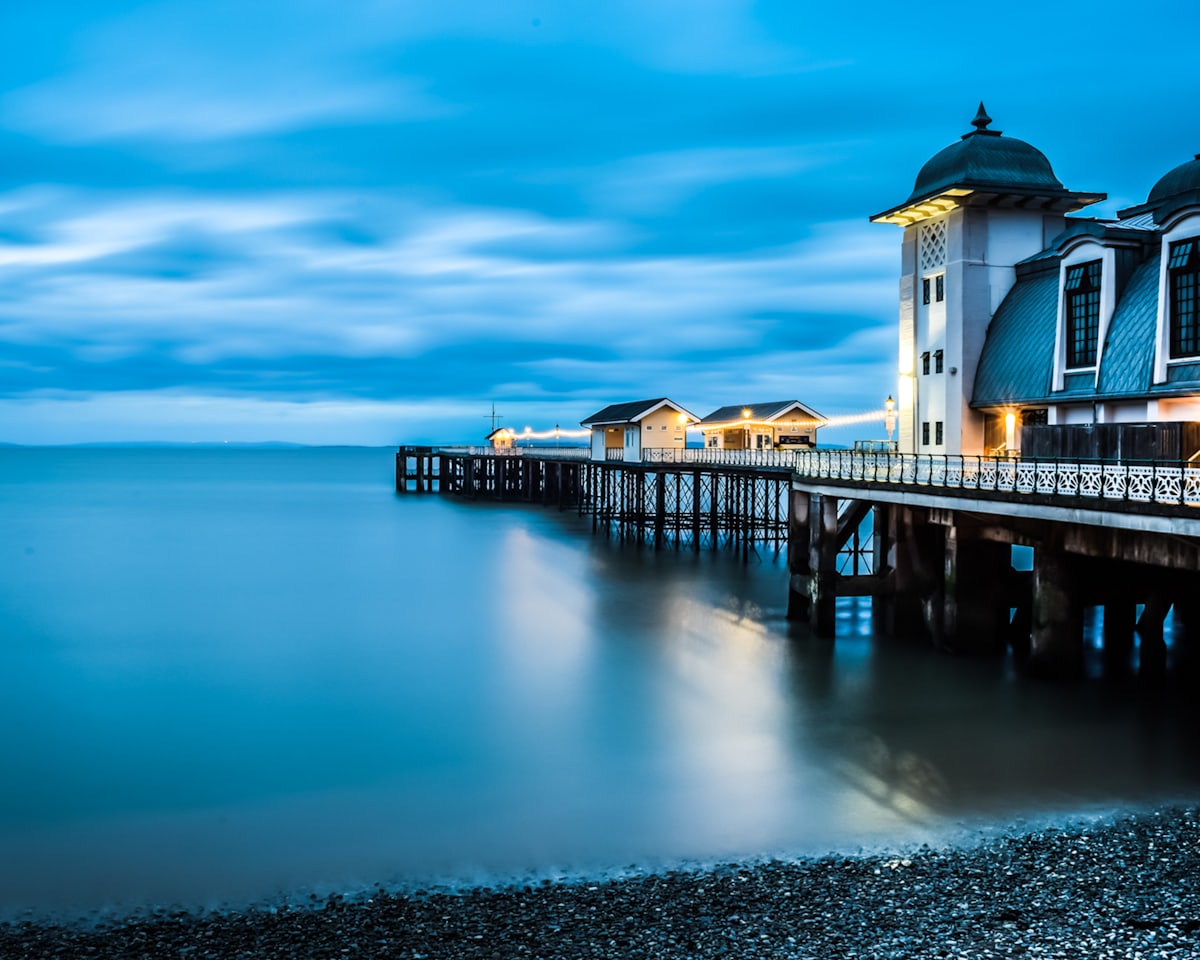 A pier pavilion at dusk, a few doors from the practice